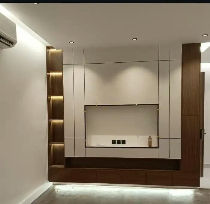 Design and installation of a recessed TV wall feature with Shiplap alternative cladding, featuring a modern and elegant touch.